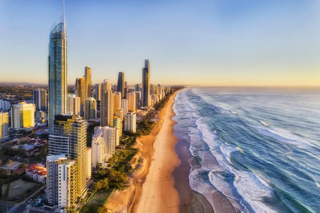 Aerial view along Gold Coast beach and line of high-rise towers