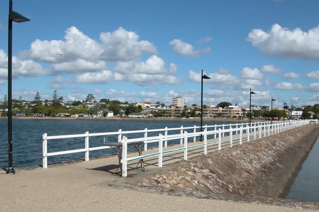 This long quiet jetty at Wynnum, Brisbane, Queensland, Australia is decorated with mosaic telling lore of the local Aboriginal people.