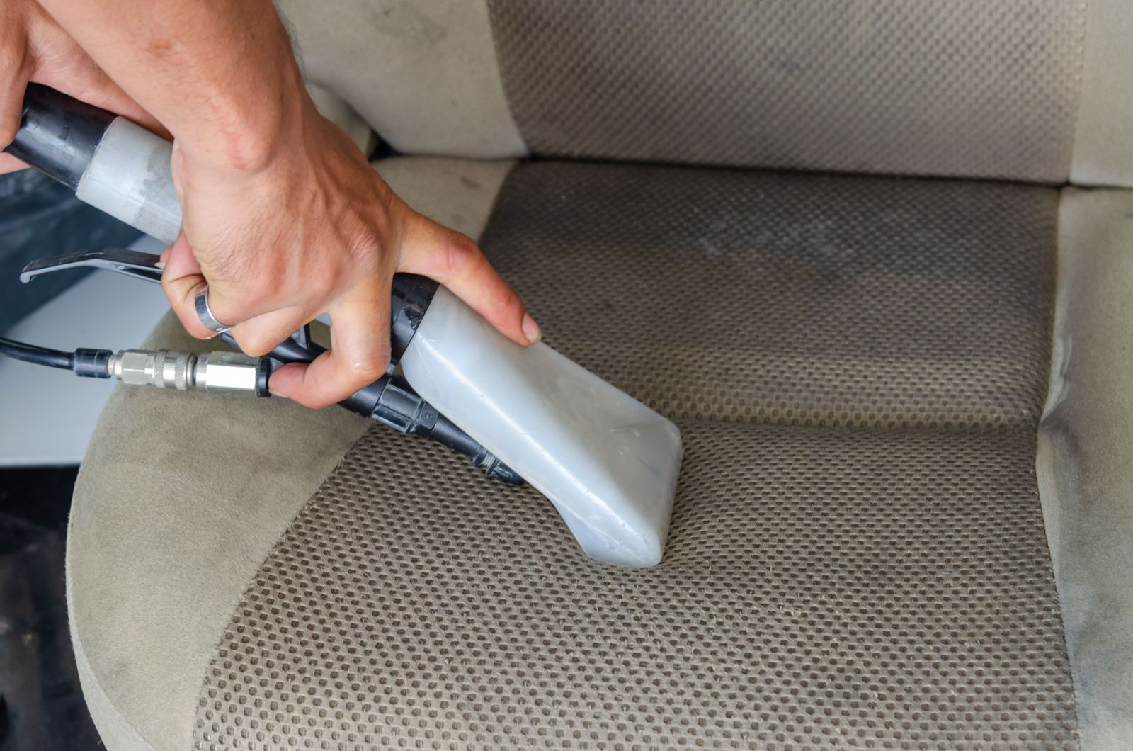 Extraction cleaning a fabric car seat
